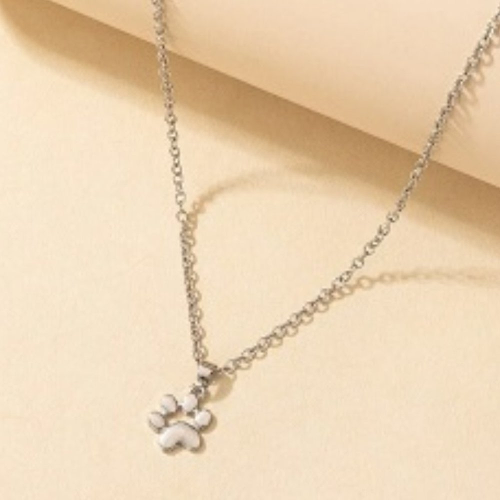 Silver Colored Necklace With Silver Paw Print Pendant